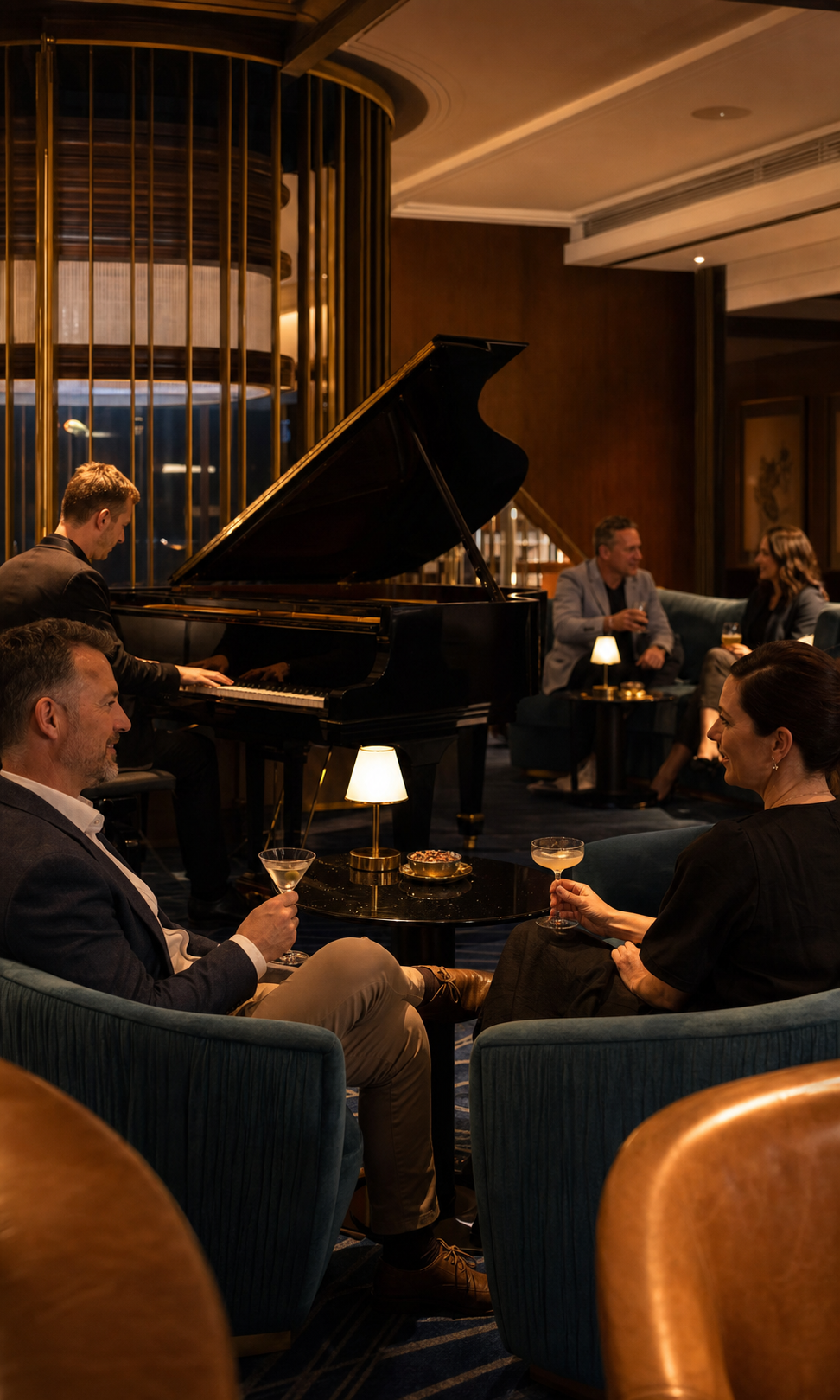 Adult guests enjoying cocktails and live piano music at Birdcage Bar in Wrest Point